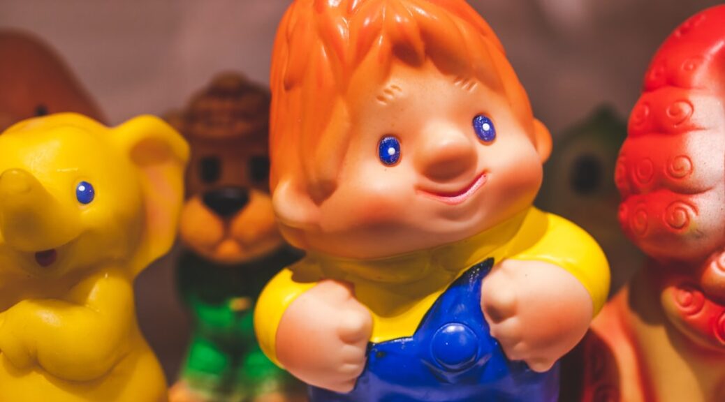 boy wearing yellow shirt fifgurine