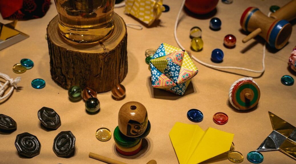Collection of vintage toys and marbles on a surface